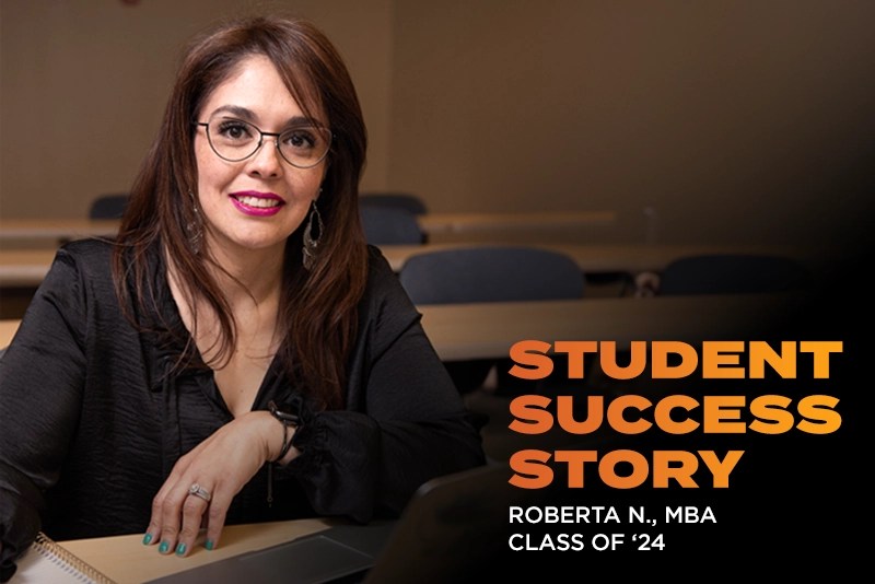 Student Success Story image of Roberta N., Class of 2024, in her office