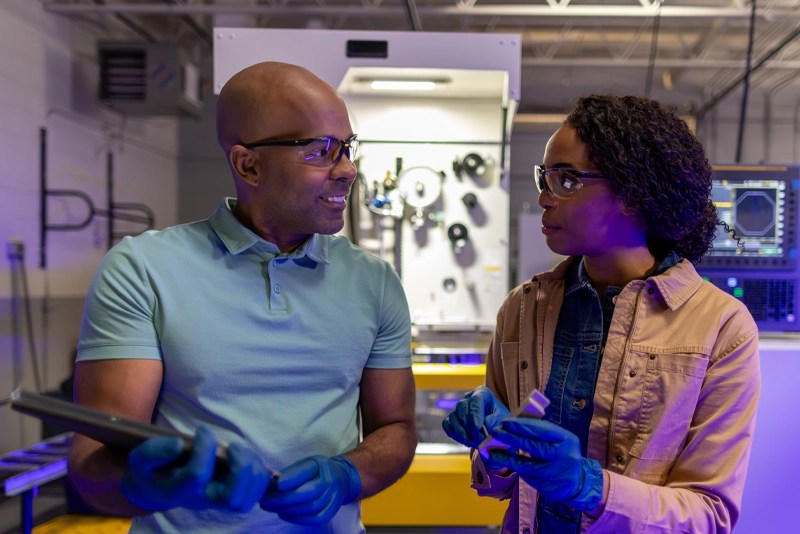 Two engineers work in a laboratory setting