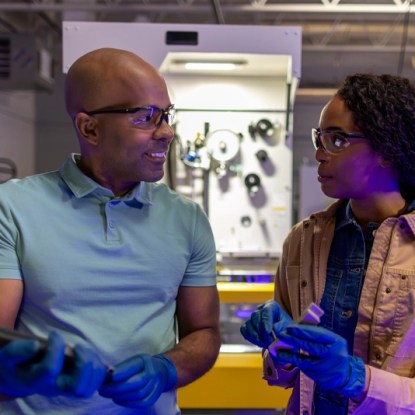 Two engineers work in a laboratory setting