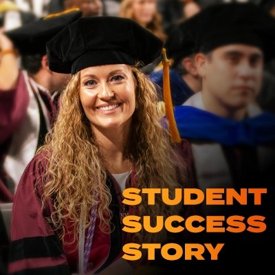 A smiling woman wears a graduation cap and gown — NMSU Global Campus commencement ceremony
