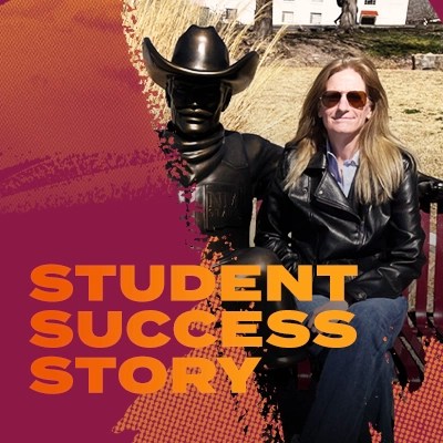 NMSU Global graduate Jennifer S. sits on a bench beside a statue of NMSU mascot Pistol Pete