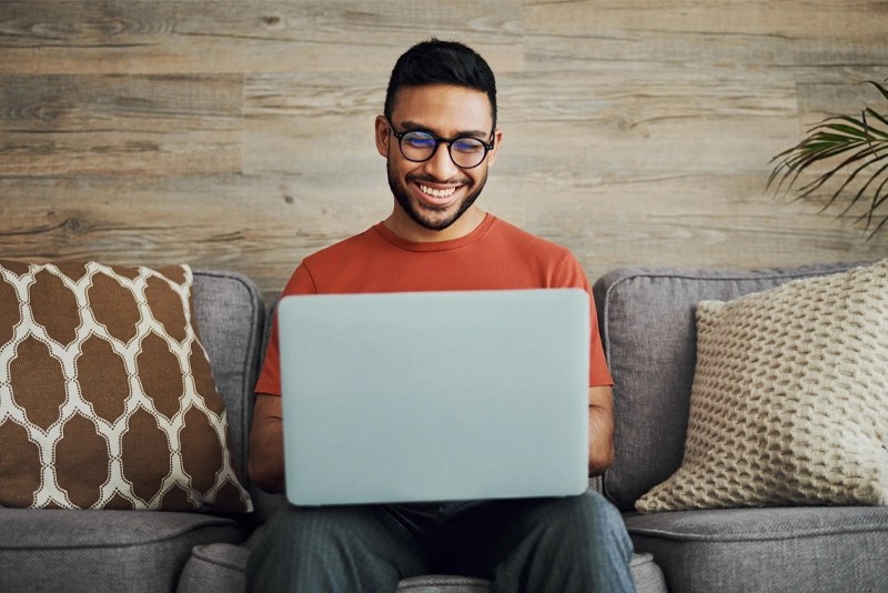 A future NMSU Global student explores flexible online degree programs on laptop