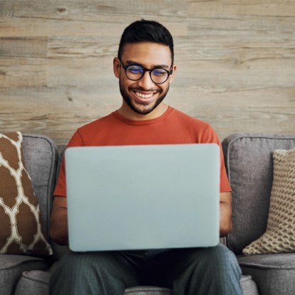 A future NMSU Global Campus student explores flexible online degree programs on laptop