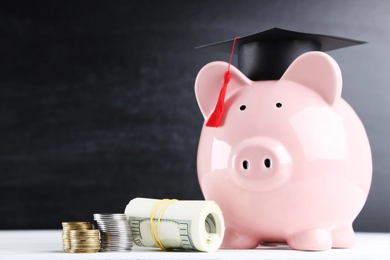 A piggy bank with a graduation cap — New Mexico State University Global Campus