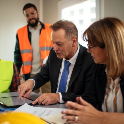 Public utility executives in a business meeting — NMSU Global Campus