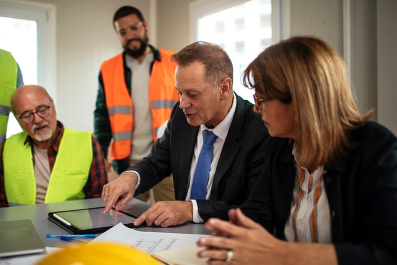 Public utility executives in a business meeting — NMSU Global Campus