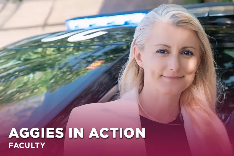 New Mexico University criminal justice instructor Marija Dimitrijevic stands beside a police vehicle