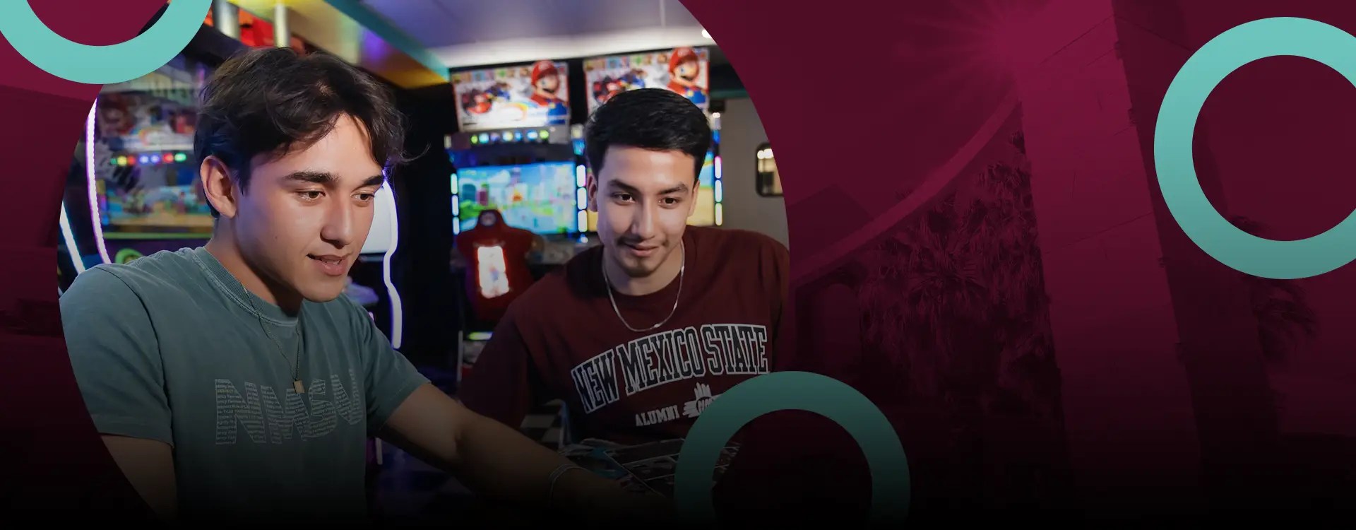 Two NMSU students looking at a computer together